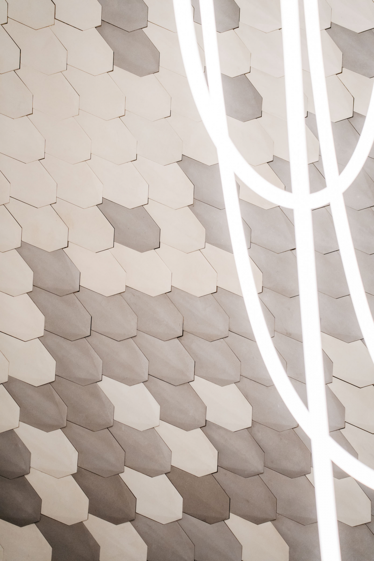 A daring experiment in five-step chromatic gradation adorns walls and ceilings